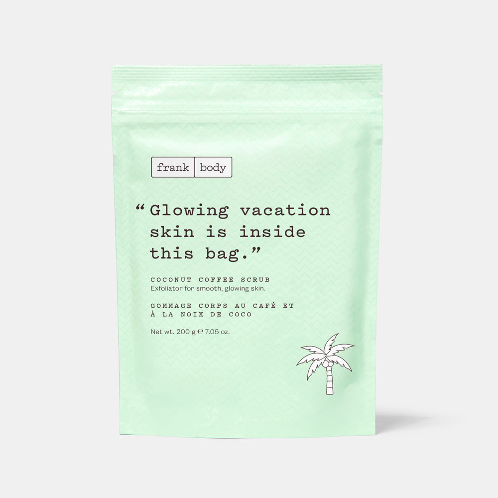 A mint green stand-up pouch of Frank Body Coconut Coffee Scrub set against a light gray background.