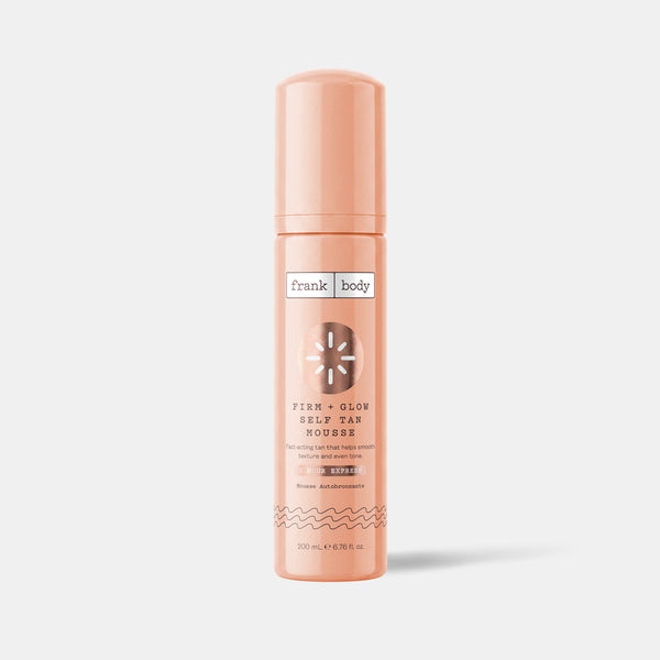 A bottle of frank body Firm + Glow Self Tan Mousse, 200ml.