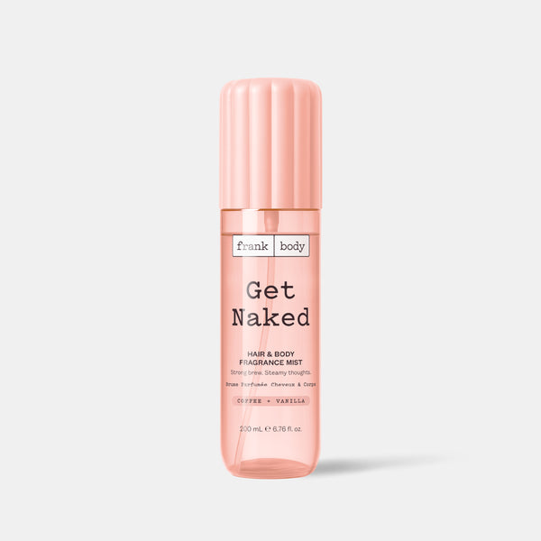 A peach bottle of frank body Get Naked Hair & Body Fragrance Mist in coffee and vanilla, 200ml.