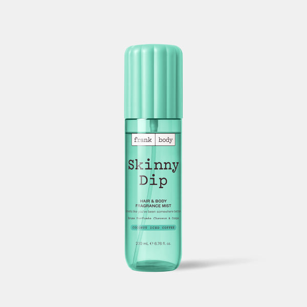 A mint green bottle of frank body Skinny Dip Hair & Body Fragrance Mist in coconut, 200ml.