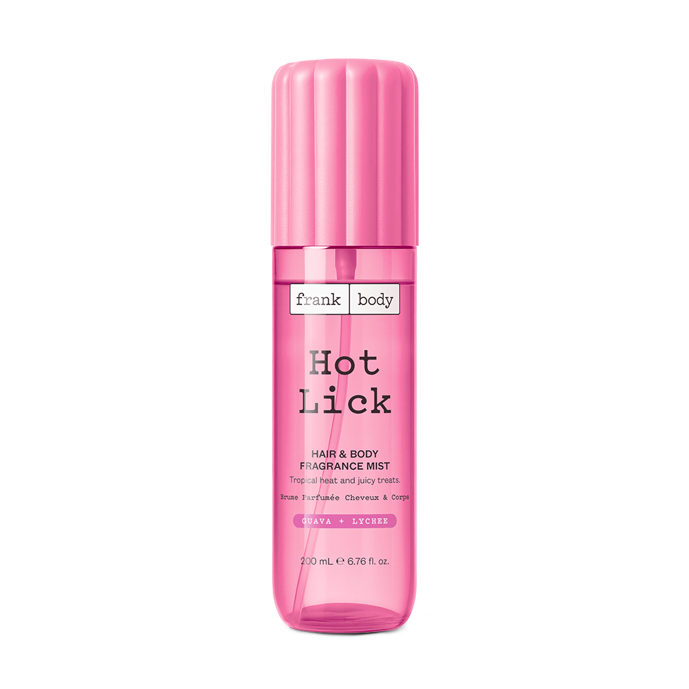 A pink 200ml bottle of frank body Hot Lick Hair & Body Fragrance Mist in guava and lychee.
