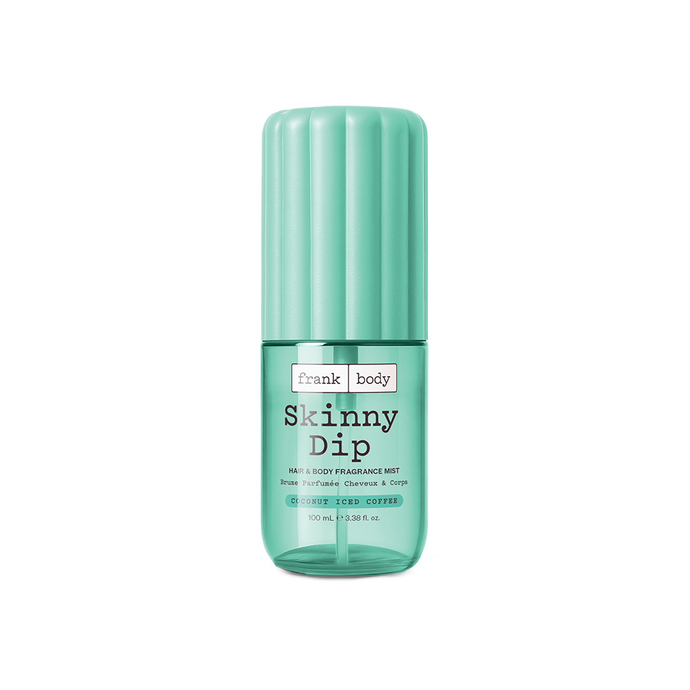 A mint green 100ml bottle of frank body Skinny Dip Hair & Body Fragrance Mist in coconut iced coffee.
