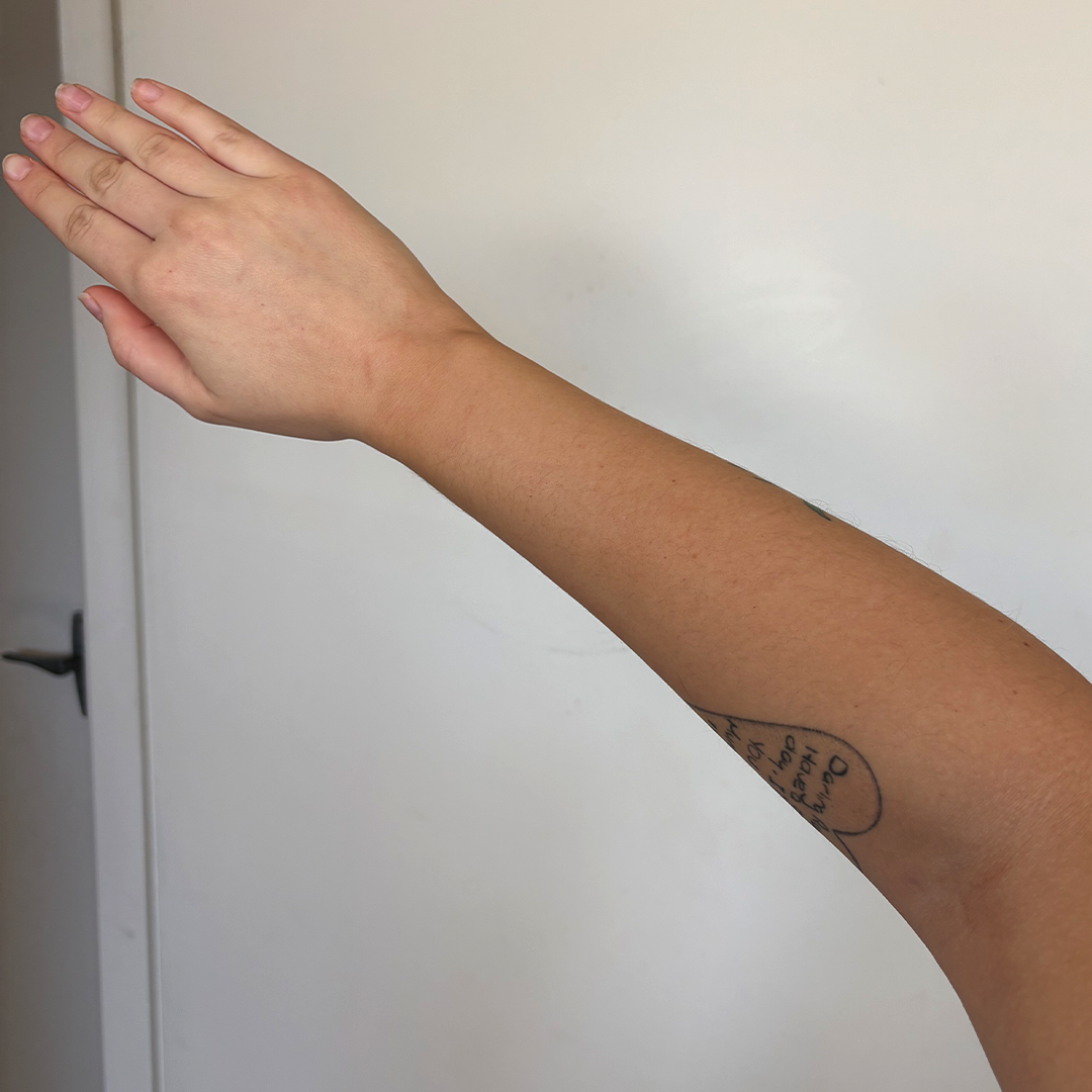 After using frank body Firm + Glow Tan Butter: a bronzed, evenly tanned stomach and torso.
